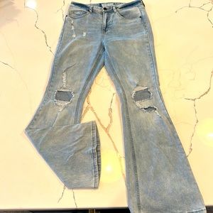 Flare jeans with rips